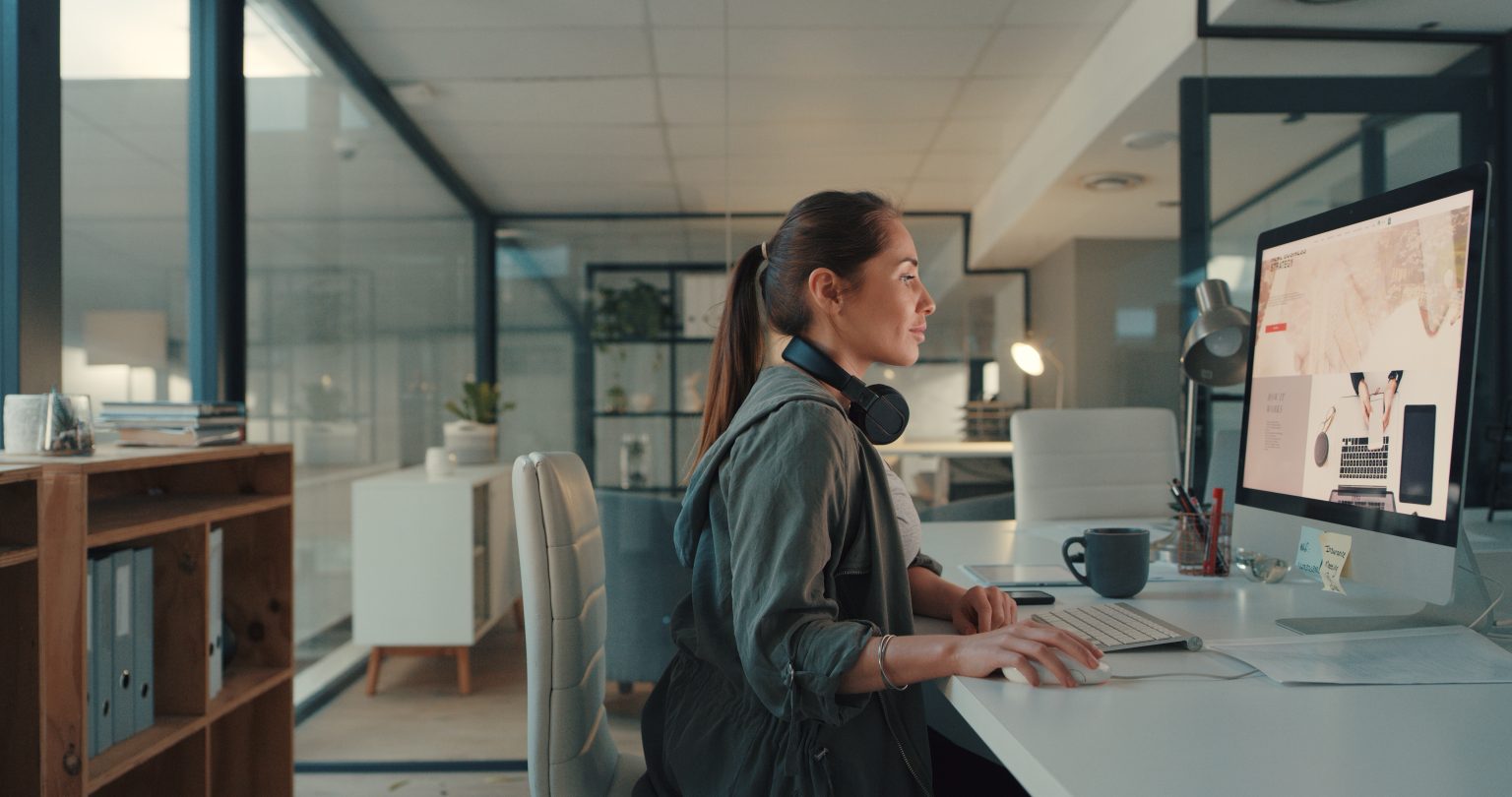 Reviewing a website design at a workstation